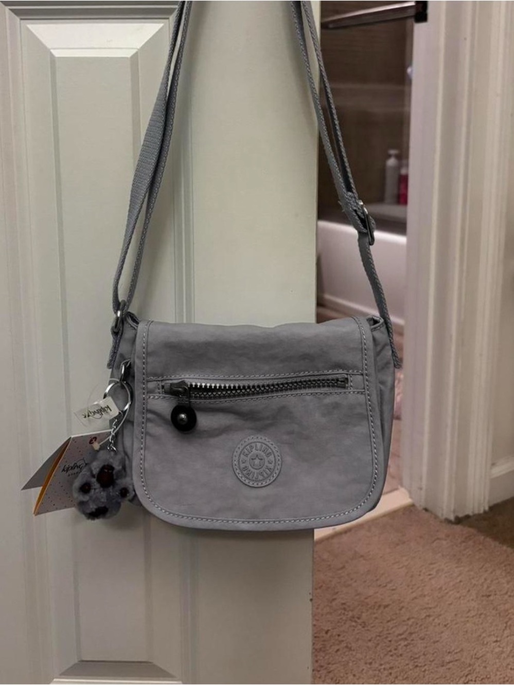Periwinkle Kipling crossbody bag and monkey